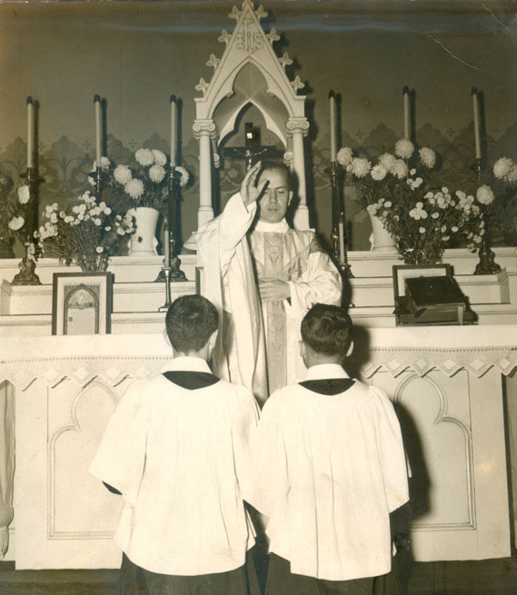 Father Hugo at Mass